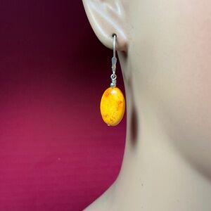 Sterling Silver Yellowish/Orange ( lighting ?) dangle earrings. 1.5 inches long